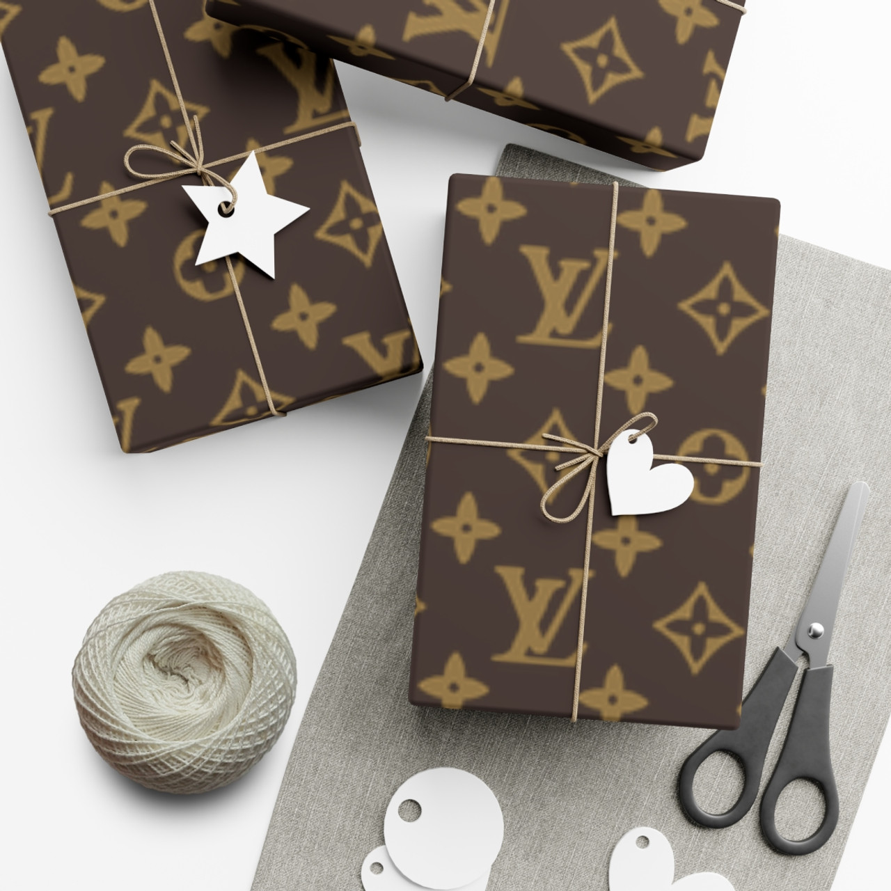 I love my collection of LV wrapping paper. My SA gave me some