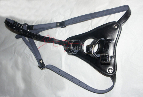Black leather harness belt with O-ring front, flat lay
