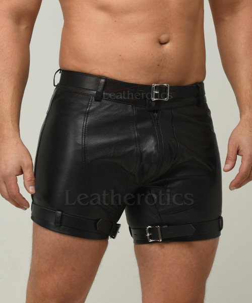 Men's black tight fit leather shorts with buckle belt and leg straps, front