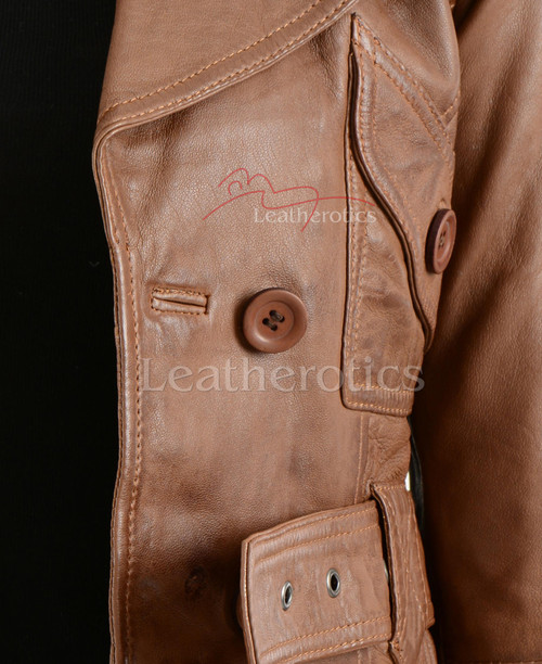 Side profile of brown leather cropped jacket showing tailored fit