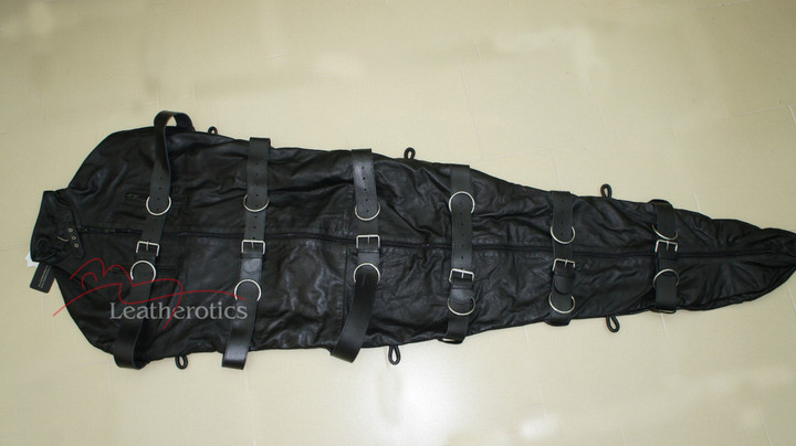 Black leather binder body bag with suspension rings and straps, full view