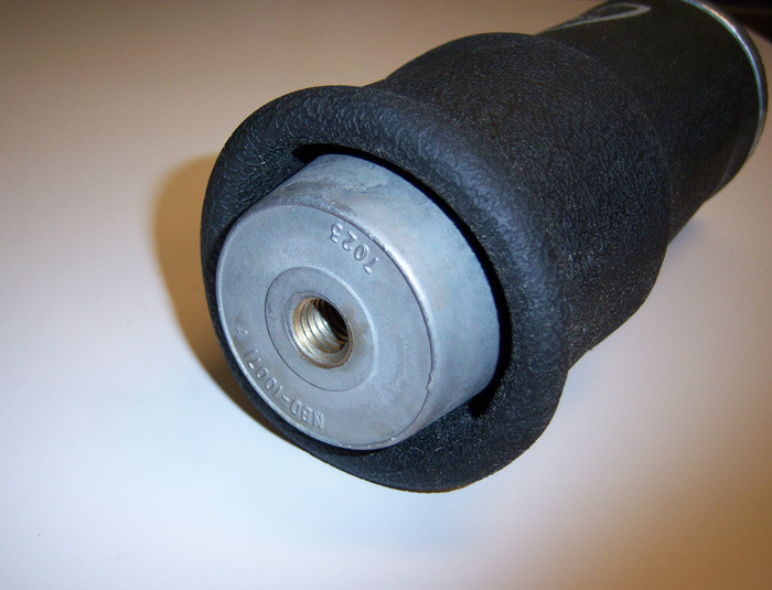 Firestone 7012 rolling sleeve air spring, 5" diameter with 1/8" npt port.