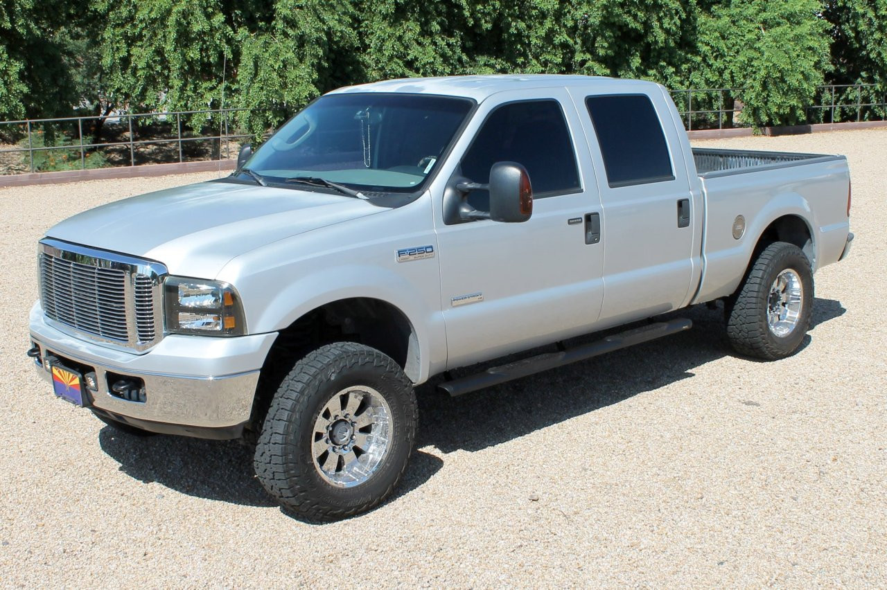 Raptor Series Oval Running Boards Black Textured Aluminum - Part# 2003-0343BT — side view