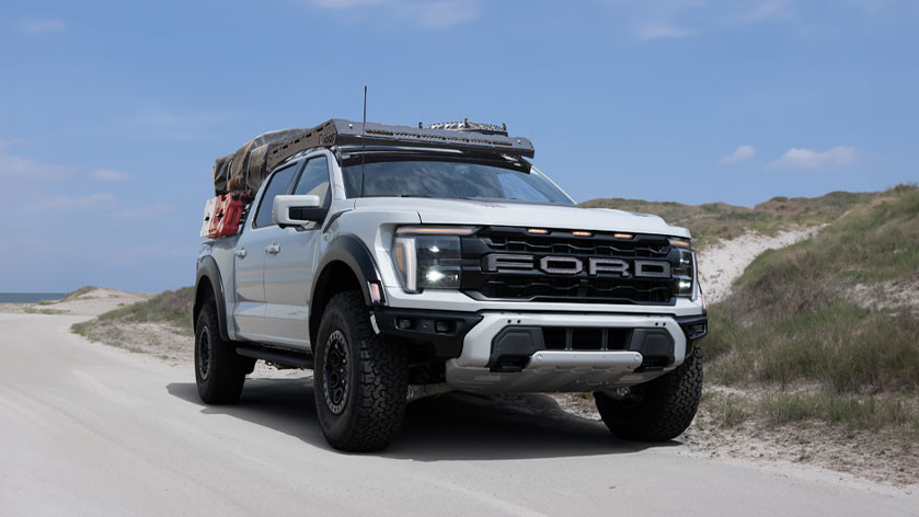 LoadLifter 5000 Ultimate with Air Spring Cradle Ford F-150 Raptor 4WD — side view