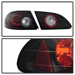 Euro Style Tail Lights - Black (5007476) — angled view