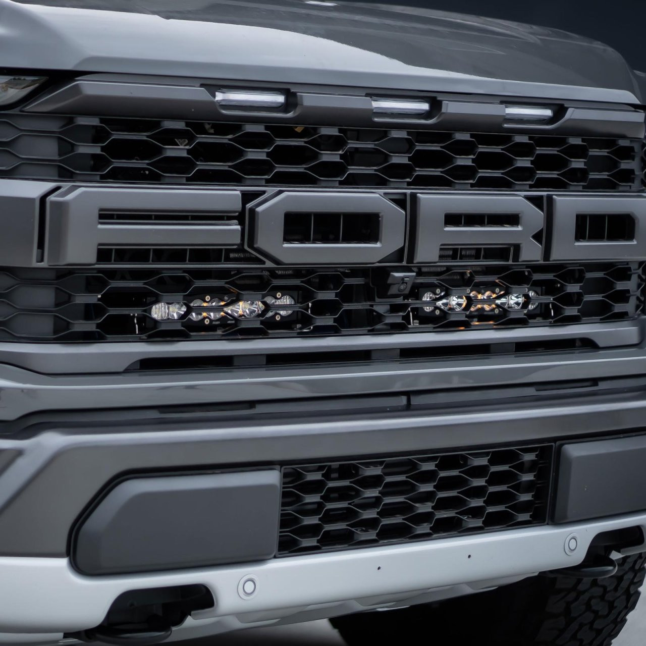 S8 10 Inch Dual Behind Grille Kit - '21-26 F-150 Raptor, '24-26 Raptor 37/R (Driving/Combo; Baja Amber) — installed view