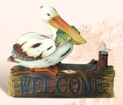 Polystone Pelican on "Welcome" Log