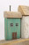 Row of Houses Rack w/ 4 Nail Pegs - Wood - Asst. Colors - 10.6"