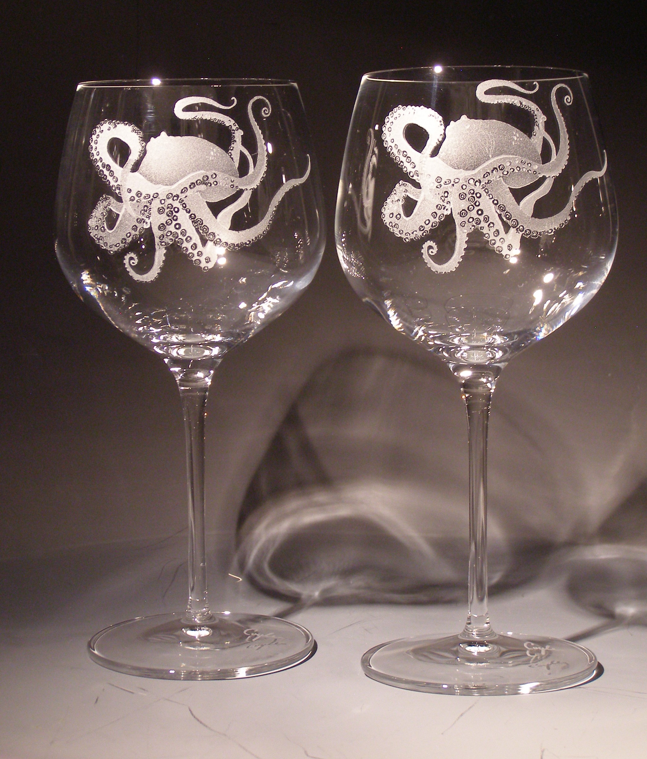 HAND ENGRAVED WINE GLASSES These wine glasses were hand engraved