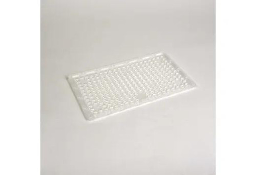 Halco SekTor Area Distribution Type IV (4) Lens, transparent rectangular lens with multiple small textured surface patterns for evenly distributed lighting.