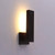 Westgate Manufacturing 12in outdoor indirect wall sconce, Model WS Die-Cast modern wall sconce, 20W, 2700K/3000K/3500K/4000K/5000K, black finish illuminated on a wall.