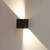 Westgate Manufacturing Wall Cube with Adjustable Beam Angle Up/Down Lights, 15W, available in 2700K, 3000K, 3500K, 4000K, and 5000K, modern wall lighting fixture illuminating wall with adjustable light projections.