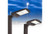 Halco SekTor Area Light 150W Type 4 5000K 120-277V Bronze, outdoor area lighting fixture with black and bronze finish installed in a parking lot during dusk.