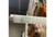 Halco Fluorescent F96 T8 Tube 96in 59W 3500K Single Pin Base Instant Start Dimmable 5900 Lumens Avg Life 18000 hrs, close-up of the fluorescent tube with green markings, stored in a warehouse setting.