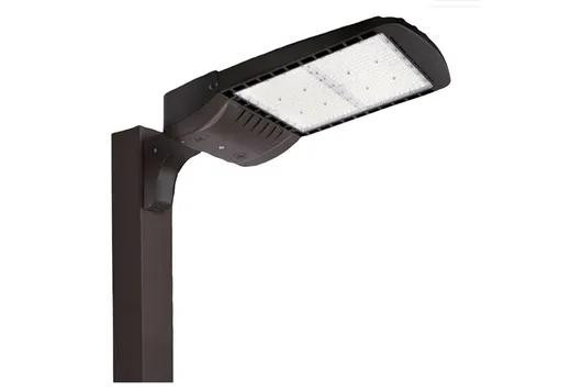 Halco SekTor Area Light 200W Type 5 5000K 120-277V Bronze with Photocell & Shorting Cap, outdoor LED area light mounted on pole showcasing durable design and energy-efficient LED lighting.