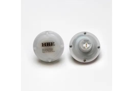 Halco DC Bi-Level Microwave Motion Sensor, round white device with electronic components inside for detecting motion and controlling lighting.