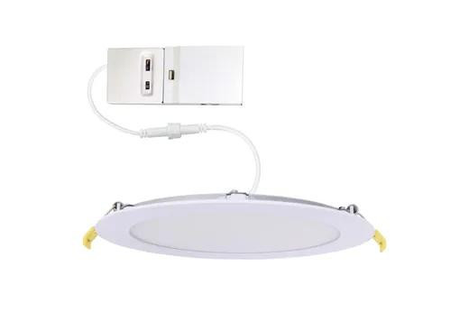 Halco Commercial Slim Downlight 6in 15W Lumen Select 820-1100-1230lm 2700-5000K Color Selectable Smooth Trim 120-277V Dimmable TRIAC-ELV & 0-10V, image of the LED downlight with power driver in the background.