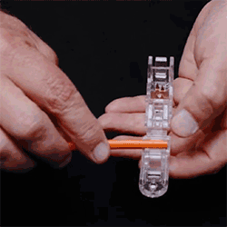 GIF clicking universal connector to tracer wire