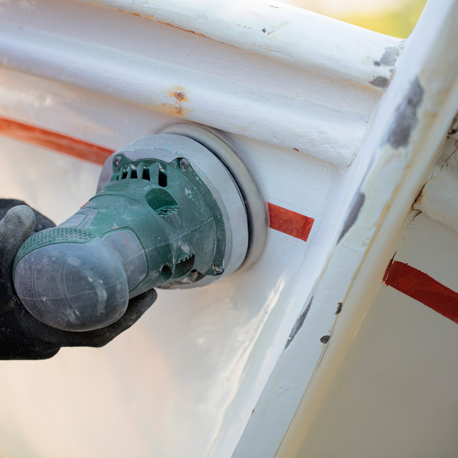Sanding boat after epoxy putty hole patch