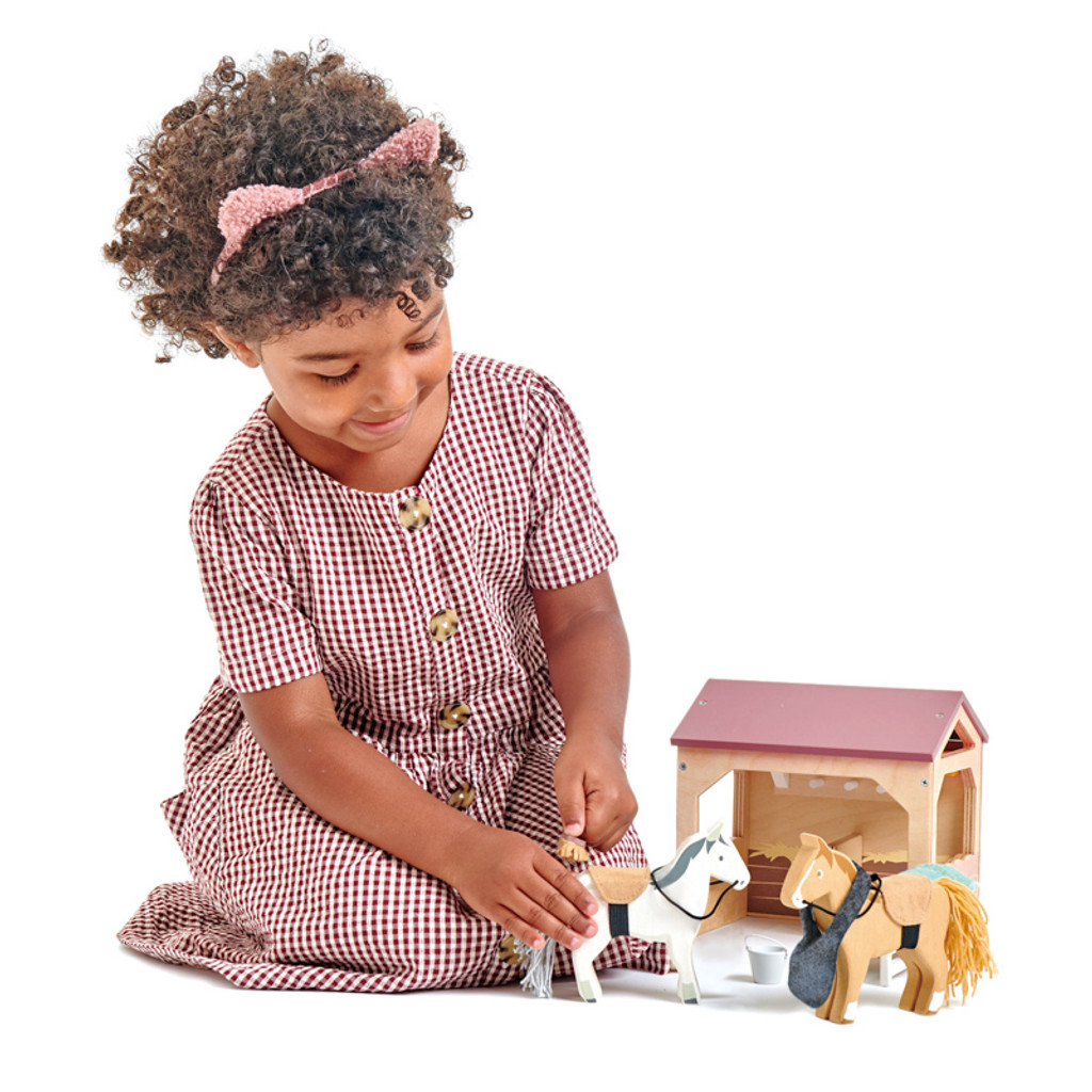 Tender Leaf Toys The Stables horse set with girl playing brushing horse hair