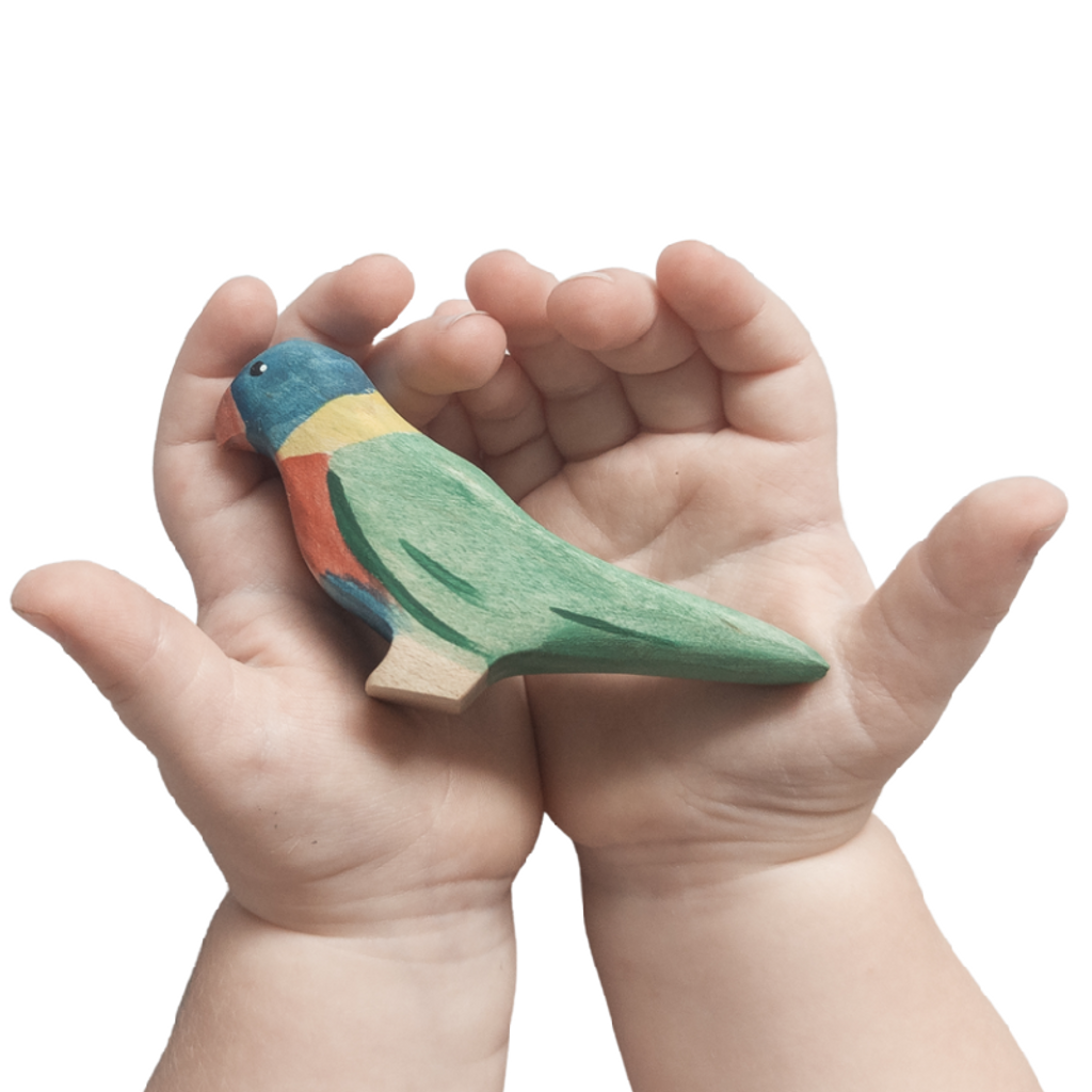 NOM Handcrafted Rainbow Lorikeet wooden toy size in hands