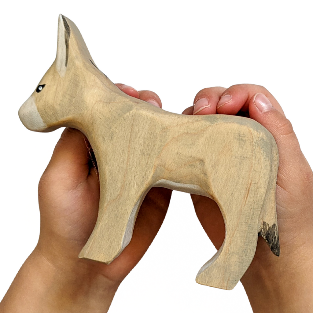 NOM Handcrafted wooden Donkey toy size in hands