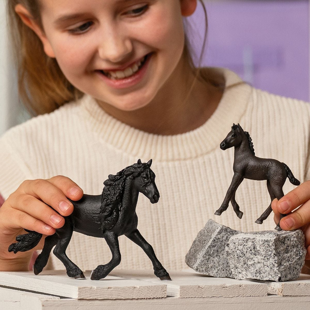 Schleich Friesian Foal and Friesian Stallion in play