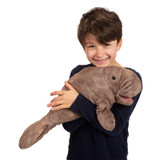 Folkmanis Manatee Hand Puppet cuddle with boy