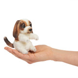 Folkmanis Mini Dog Finger Puppet on a hand