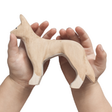 NOM Handcrafted wooden Dingo toy size in hands