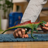 Schleich Concavenator dinosaur toy in play