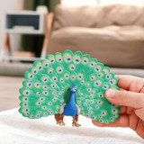 Schleich Peacock 2026 lifestyle size in hand