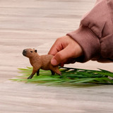 Schleich Capybara toy figurine lifestyle size in hand