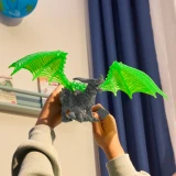 Schleich Rock Dragon toy in hand