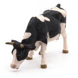 Papo Black and White Cow Grazing