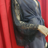 Semi sheer beach/bedroom kimono in dark blue with contrast  lace flare sleeves. Size S/M. 
