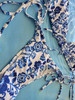 Bikininset in white and blue flower pattern. Size M, L 