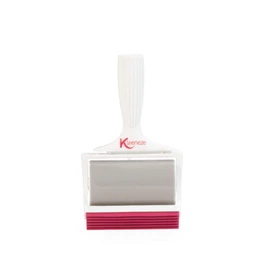 Kleeneze white and pink pet hair remover roller with handle, shown front view