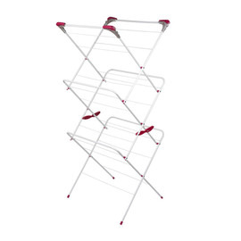 White folding clothes airer with pink accents, shown open for drying laundry