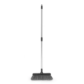 Grey indoor broom with long silver handle, upright view