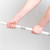 Close-up of hands holding a white extendable pole with grey grips, product feature shown.