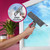 Window cleaning spray tool with microfibre pad in use on glass