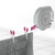 Retractable indoor washing line with two pink clips holding a grey towel