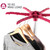 Clothes airer with pink arms holding jumpers on hangers, max load 10 kg.