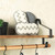 Pair of grey and white zigzag chenille cleaning pads on wooden shelf