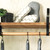 Set of grey and white mop pads on a wooden shelf with plant, for UK cleaning product listing