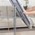 Ironing board metal rest close-up showing attachment design and grey finish
