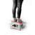 Folding grey plastic step stool with red polka dot top, side view