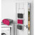 White over door towel rail with three hanging bars, shown holding grey and pink towels.