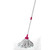 Pink and white cotton mop with handle on tiled floor, mop head wet